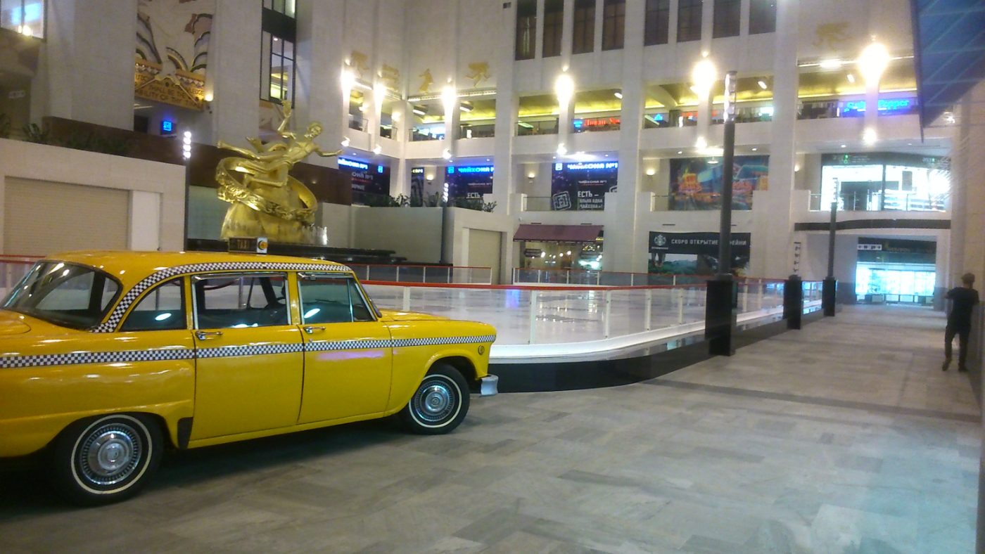 Custom mall rink with decorative cladding and yellow taxi display