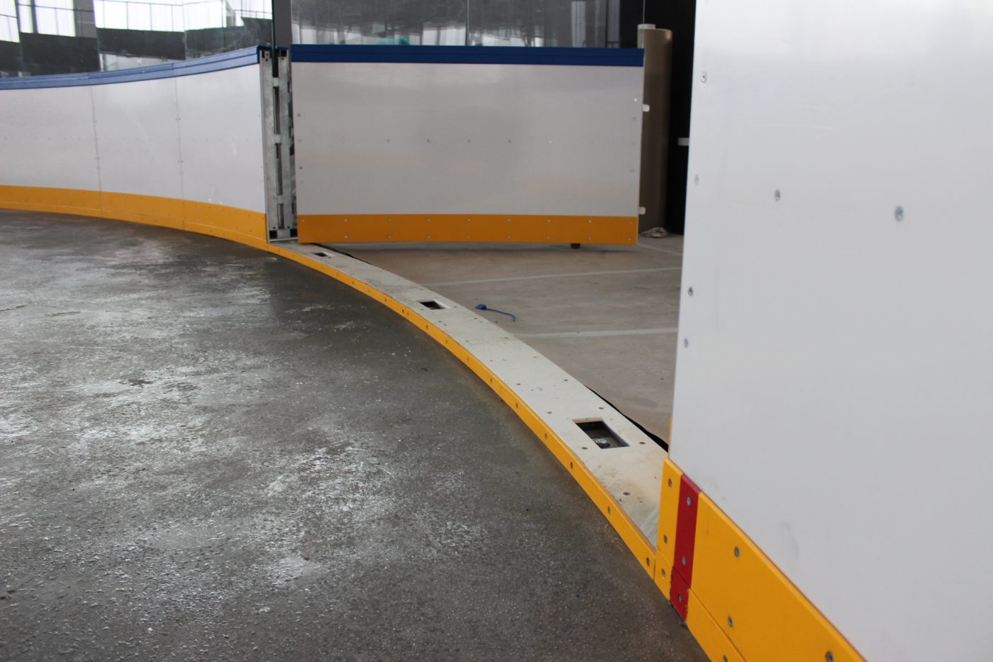Kickplate corner detail with yellow trim