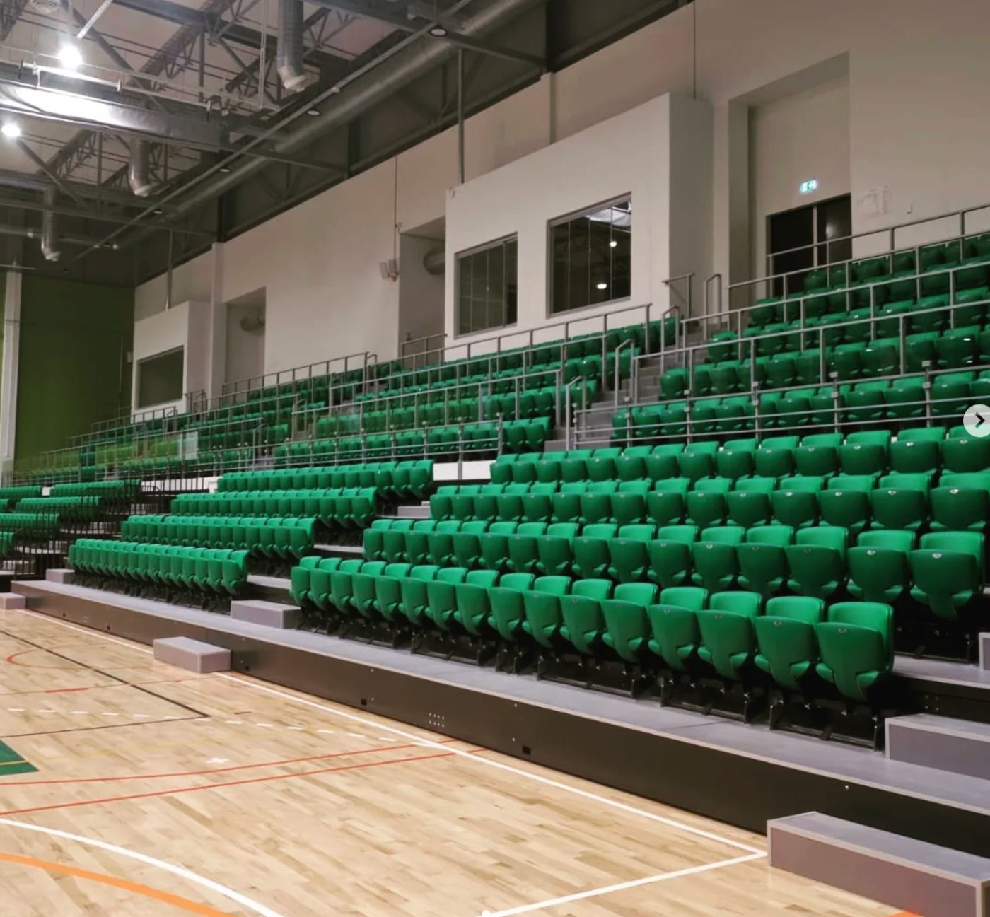 Indoor telescopic seating in a multi-sport hall