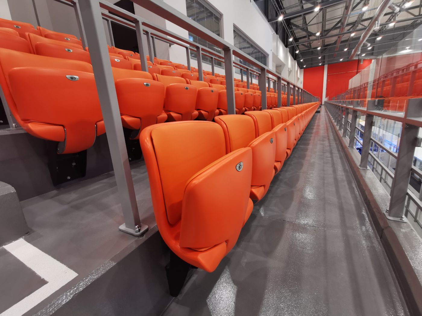 Green indoor grandstand and folded seating row